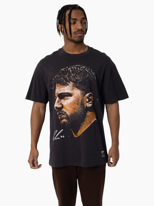 Luka Dončić Big Head Tee in vintage black featuring oversized graphic portrait for the ultimate fan.