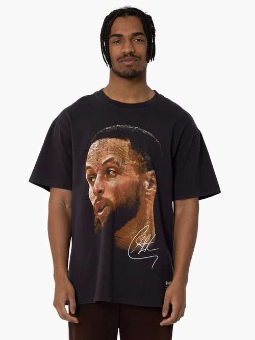 Detail of Stephen Curry Big Head Tee in vintage black featuring oversized player portrait.